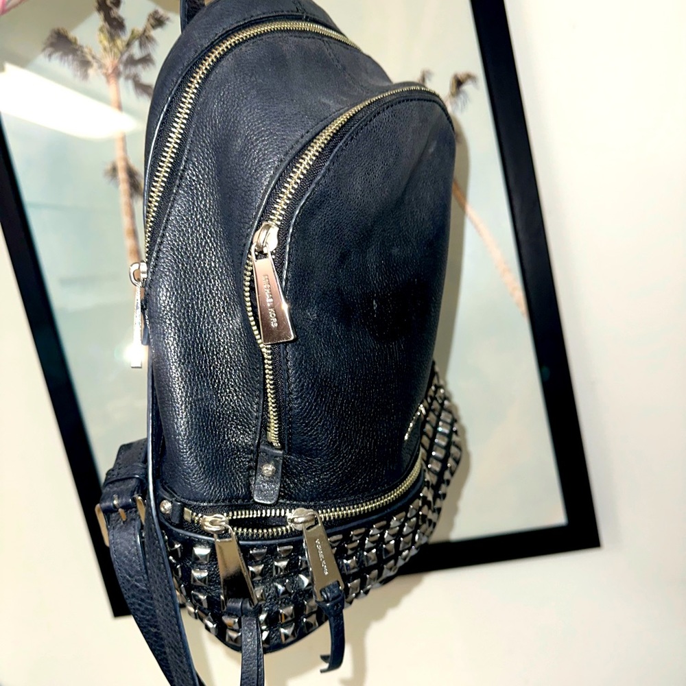 MK black leather studded backpack